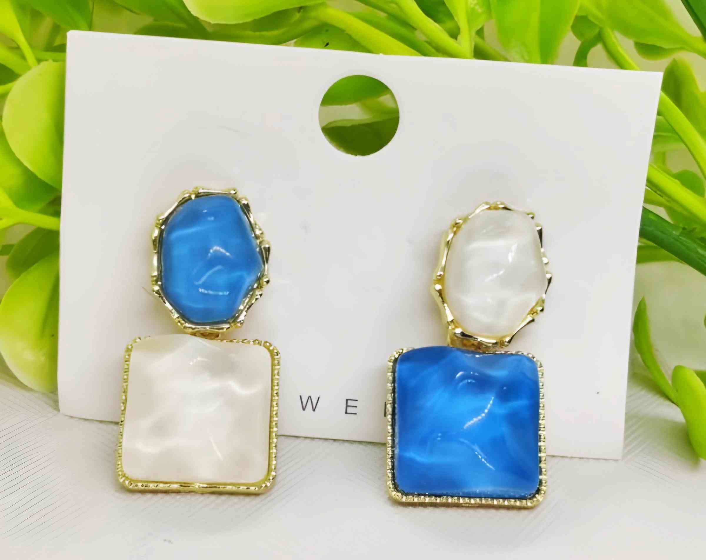 Elegant Blue And White Resin Statement Earrings Timeless Design With A Modern Twist