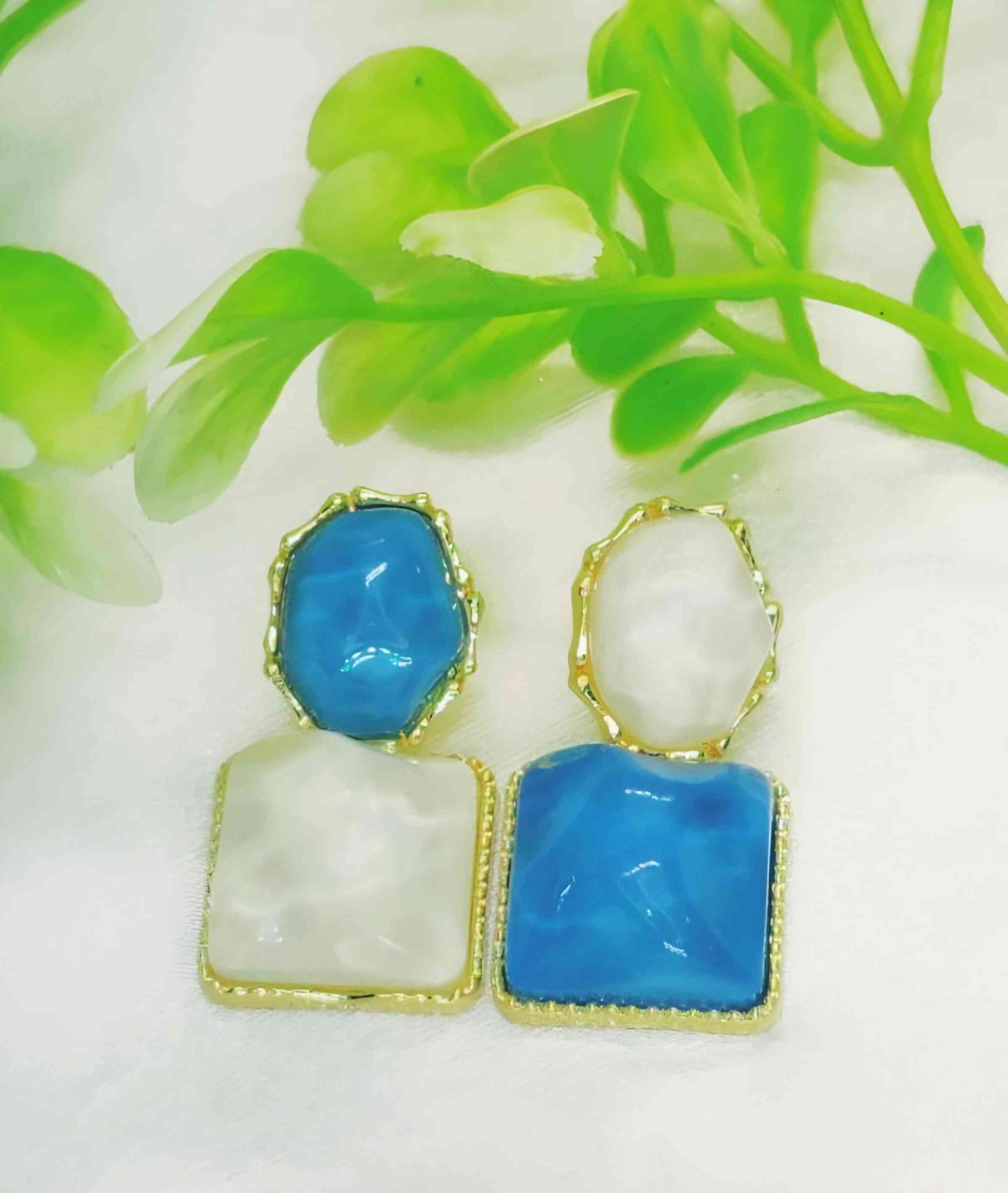 Elegant Blue And White Resin Statement Earrings Timeless Design With A Modern Twist