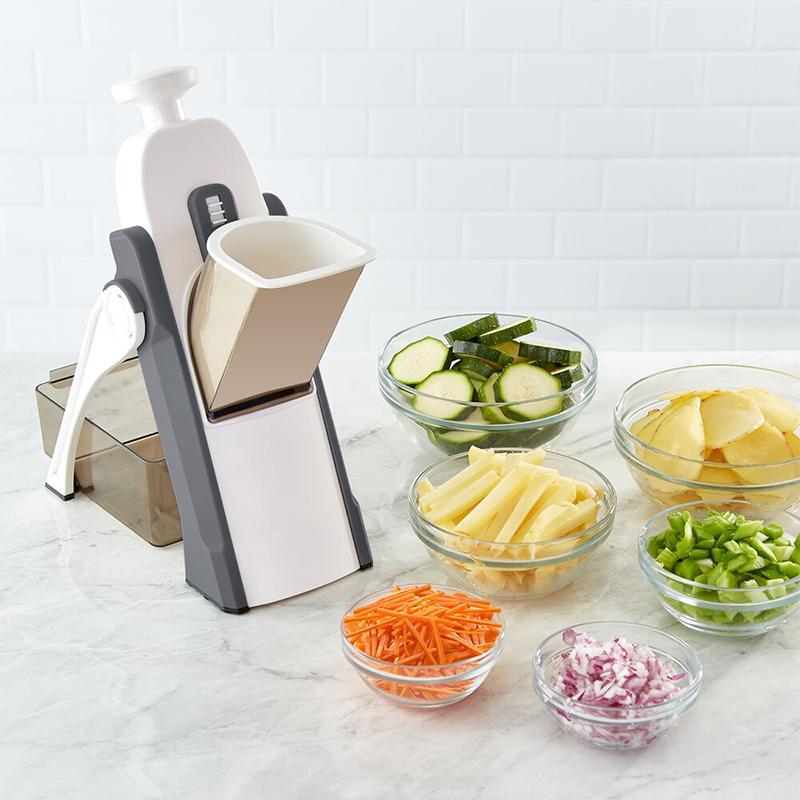 Standing push-handle vegetable slicer with collection container