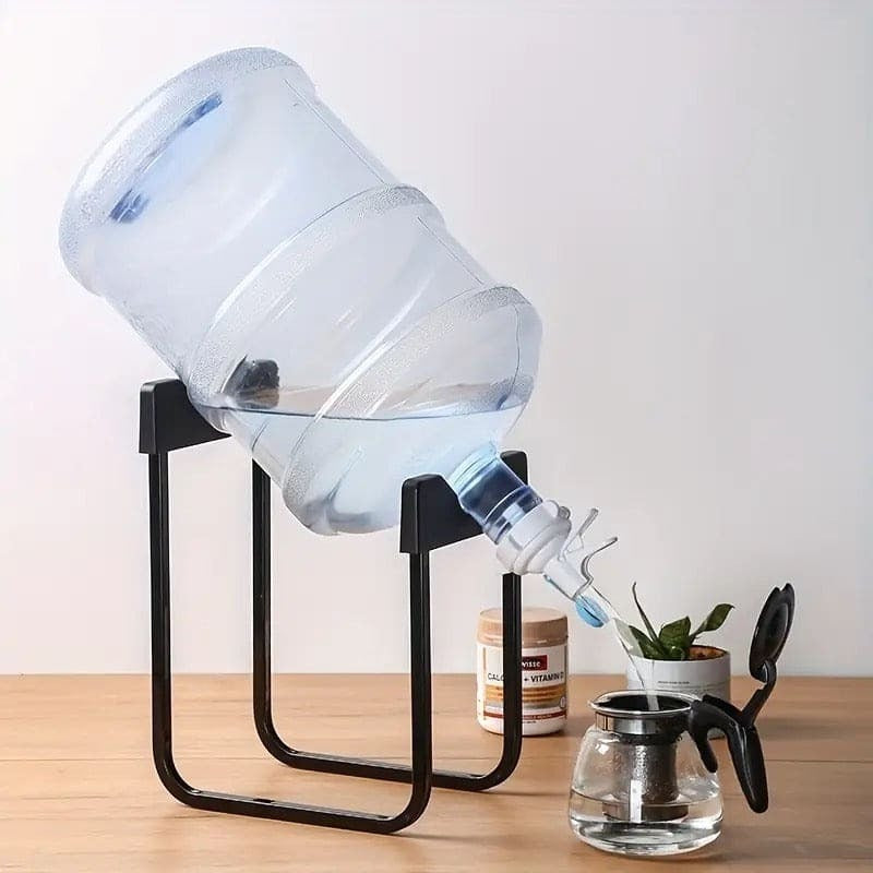 Water dispenser stand and tap supporting a compatible bottle on a kitchen counter; bottle not included